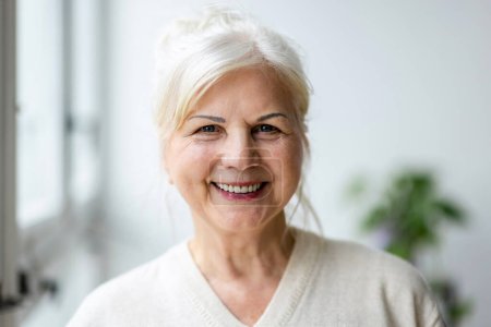 Photo for Portrait of smiling senior woman looking at camera - Royalty Free Image