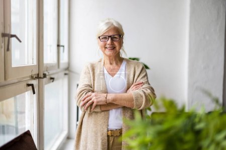 Photo for Portrait of smiling senior woman looking at camera - Royalty Free Image
