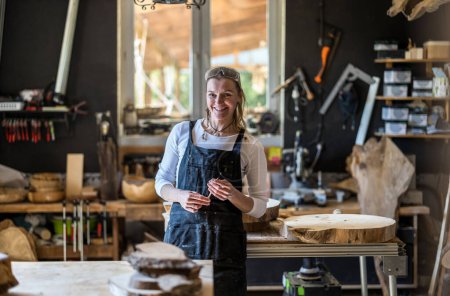 Photo for Portrait of confident craftswoman in her workshop - Royalty Free Image