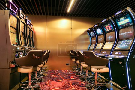 Photo for Nikolaev, Ukraine, - October 21, 2021: slot machines of the casino "First" in the hotel "Green Day". Deluxe Game Club in the hotel. The interior of the hotel-based casino. - Royalty Free Image