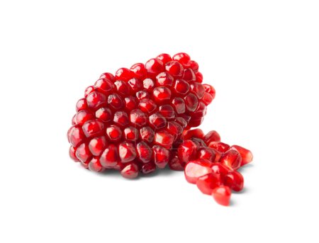 Téléchargez les photos : Beautifully peeled part of a pomegranate and several seeds separately on a white background close-up. Peeled slice of ripe pomegranate with large grains isolated macro shot. - en image libre de droit