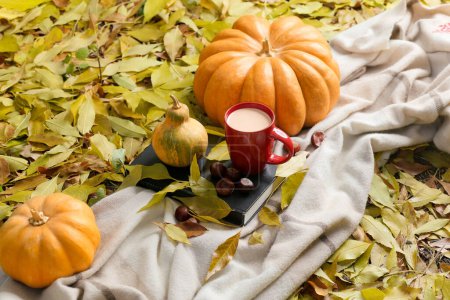Photo for Autumn Park. Pumpkin season. Cozy autumn concept. Harvesting. The golden time of the year. Autumn leaf fall. Composition with pumpkin. Halloween. Outdoor picnic in the park. Leaves background. - Royalty Free Image