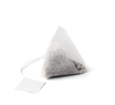 Photo for Pyramid shaped tea bag with label isolated on white background. - Royalty Free Image