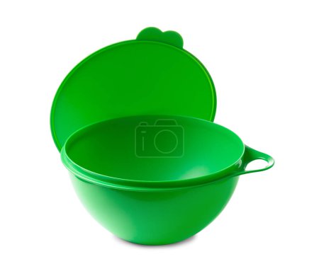 Photo for Large green plastic container with a sealed lid with a capacity of four liters, isolated on a white background. Ecoplastic kitchenware for transporting and storing food. - Royalty Free Image