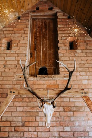 Photo for British wedding in barn, skull decorations, gothic style, wedding ceremony decor - Royalty Free Image