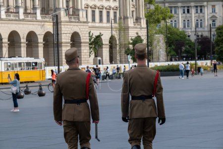 Photo for Budapest, Hungary - 1st September 2022: Back view of two Guards of honor near Hungarian Parliament Building - Royalty Free Image