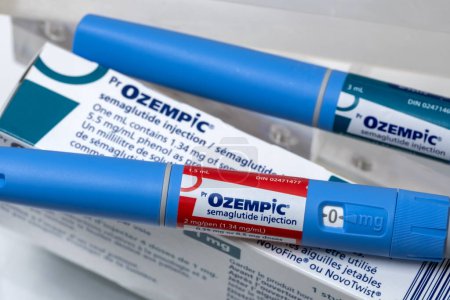 Photo for Montreal, CA - 16 November 2023: Ozempic semaglutide injection pens and box. Ozempic is a medication for obesity - Royalty Free Image