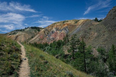 Hiking trail to famous sights in Altai. Kyzyl-Chin tract, Mars, Mars-2. Summer landscape, unusual view of the mountains red, yellow, brown and gray colors