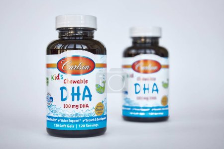 Photo for Carlson brand, Kid's Chewable DHA, docosahexaenoic acid. Two jars on Gray background. Online shopping, iHerb store. Bishkek, Kyrgyzstan - 8 Dec 2023. - Royalty Free Image
