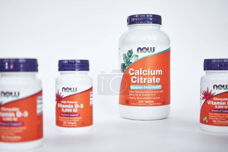 Photo for Production of NOW Foods Company: jars of different sizes with vitamins and minerals. Calcium Citrate and vitamin D 3. iHerb online store. Food supplement. Bishkek, Kyrgyzstan - 8 Dec 2023. - Royalty Free Image