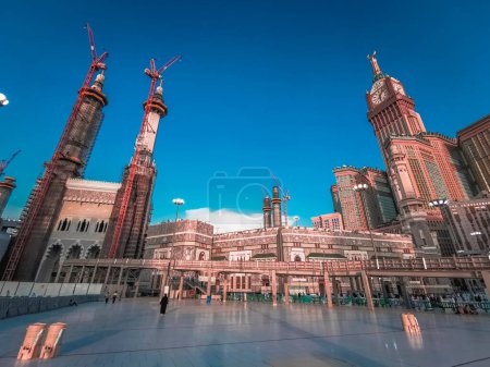 Photo for Skyline with  Abraj Al Bait (Royal Clock Tower Makkah) (right) in Makkah, Saudi Arabia. The tower is the tallest clock tower in the world at 601m (1972 feet), built at a cost of USD1.5 billion. - Royalty Free Image