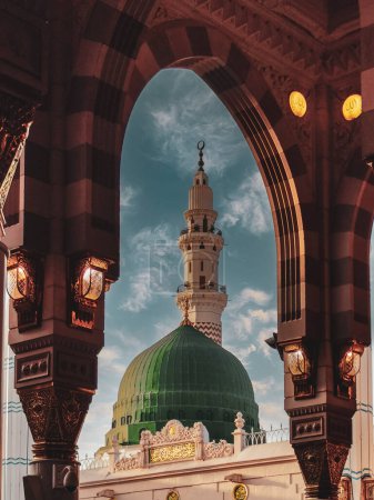 Photo for General view green dome and Moorish pattern arches of Nabawi mosque in Al Madinah, Kingdom of Saudi Arabia. - Royalty Free Image