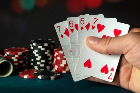 Photo for Poker cards with two pairs combination in the player hand. Winning combination in a game in a poker club. The concept of fortune or good luck in the game - Royalty Free Image