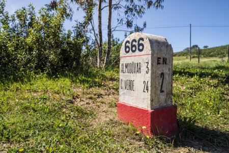 Photo for Road milestone indicating 666th kilometer on famous national road N2 going across Portugal, Almodovar - Royalty Free Image