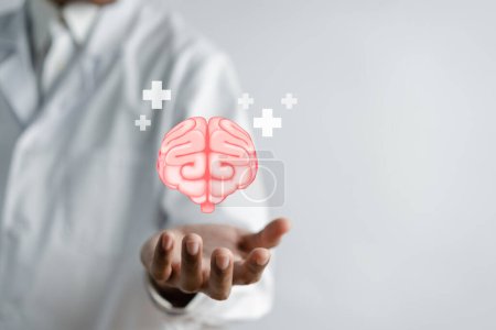 Photo for Doctor holding virtual human brain and plus signs mental health positive thinking, idea creative intelligence thinking or Awareness with energy boost, energy or fresh wellness emotion concept. - Royalty Free Image
