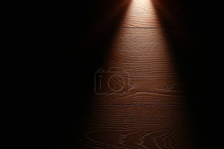 Photo for Strong light source from flash light shining on the floor in the dark. Surface with copy space. power outage. collapse of the power system. Flashlight and a beam of light in darkness - Royalty Free Image