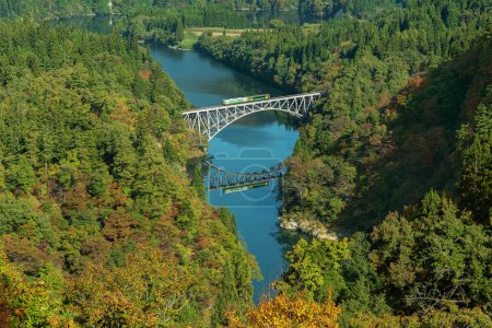 Photo for Idyllic landscape of Tadami Sen, Tadami Railway Line and Bridge Reflection in Mishima Machi, Aizu, Fukushima, Japan - Royalty Free Image
