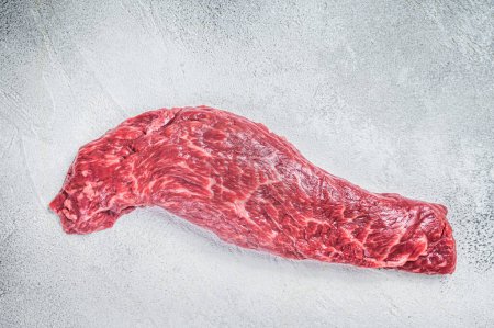 Foto de Raw fresh meat Steak Machete, skirt. White background. Top view. Copy space. - Imagen libre de derechos
