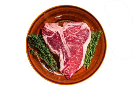 Rohes Porterhouse Rindfleisch Steak mit Kräutern auf einem Teller. Isoliert auf weißem Hintergrund