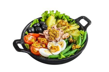 Photo for Gourmet nicoise salad with vegetables, eggs, tuna and anchovies in a pan. Isolated on white background, Top view. - Royalty Free Image