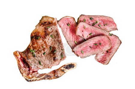 Foto de Filete de carne de res Striploin a la parrilla en rodajas. Aislado sobre fondo blanco, Vista superior - Imagen libre de derechos