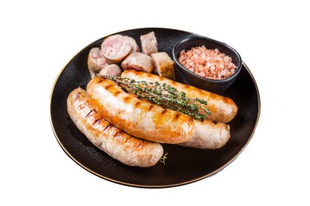 Roasted Bratwurst and Bockwurst pork meat sausages in a plate. Isolated on white background. Top view