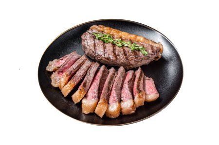 Sliced grilled medium rare Top sirloin beef steak on a plate. Isolated on white background