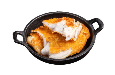 Roasted tilapia fillet in a skillet with breadcrumbs. Isolated on white background