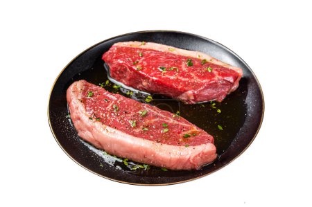 Raw marbled beef meat steak marinated with olive oil, thyme, salt and pepper. Isolated on white background