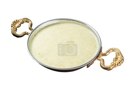 Vichyssoise French cream soup with leek, potato and onion. Isolated on white background. Top view