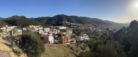 Photo for Morocco, Africa: panoramic view of Moulay Idriss, town near Meknes and overlooking the ruins of Volubilis, famous for being the site of the tomb of Idris I, first major Islamic ruler of the country - Royalty Free Image