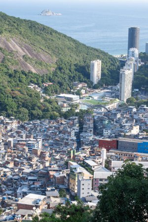 Photo for Brazil: the postcard skyline of Rio de Janeiro seen from Rocinha, the most famous favela of the city and the largest slum in the country between Gavea, Sao Conrado and Vidigal districts - Royalty Free Image