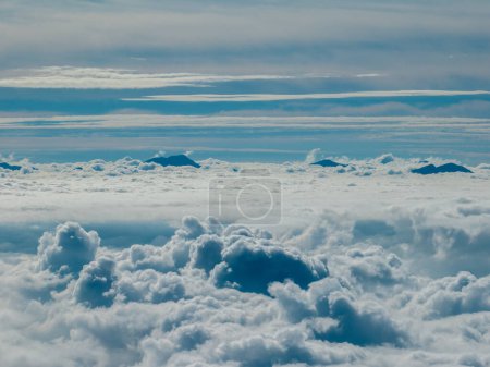 Aerial view of the peaks of Himalaya from Nagarkot, Nepal. A sea of clouds and Himalayan peaks towering out