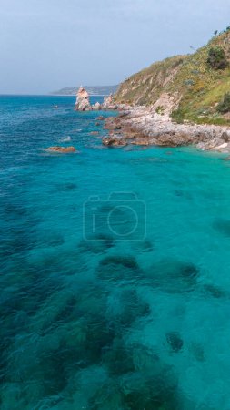 Aerial view of Michelino beach in Parghelia, Tropea. Calabria. Italy. Transparent sea and luxuriant nature. The most beautiful beach in Europe