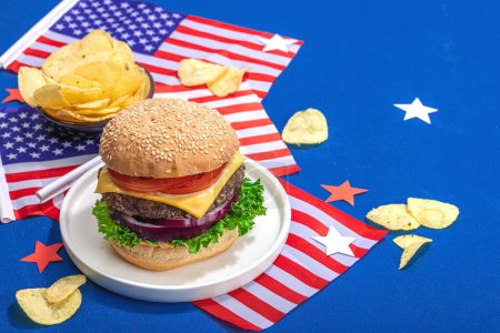 Photo for Homemade burgers. An American classic, traditional food for picnic, party or celebration Independence Day. Hard light, dark shadow, flat lay, blue background, copy space - Royalty Free Image