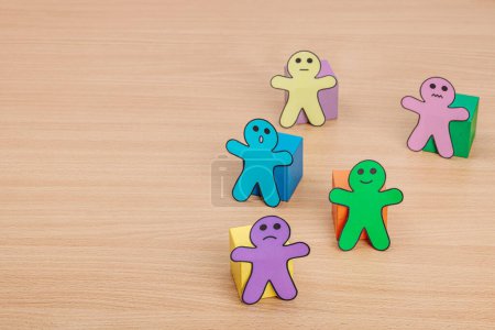 Photo for World mental health day. Paper men figures with different emotions. Feedback rating, customer review, experience, satisfaction survey or assessment concept, flat lay, wooden table, copy space - Royalty Free Image