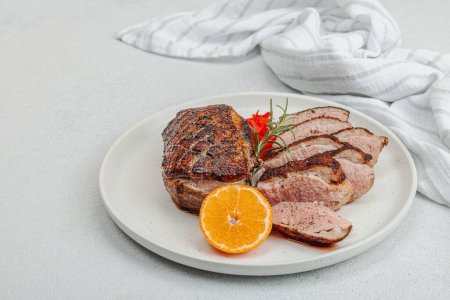 Photo for Fried duck breast with fresh orange and ginger, ready to eat food. Domestic tasty cuisine, poultry meat fillet. Light stone concrete background, copy space - Royalty Free Image