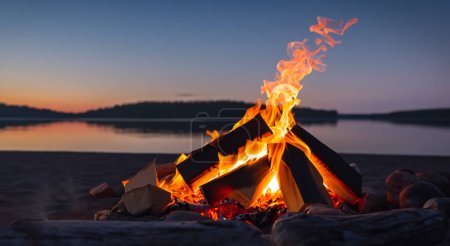 beautiful campfire in the middle of the beach at sunset
