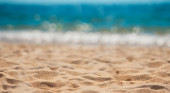 beautiful beach sand with the sea in the background blur Poster #664751556