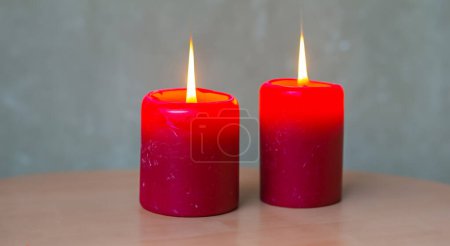 Photo for Beautiful red candles lit with fire in high definition and sharpness HD - Royalty Free Image