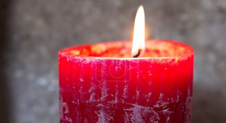 Photo for Beautiful burning red candle in high resolution HD - Royalty Free Image