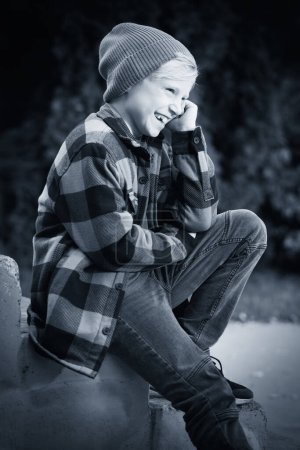 Photo for Young boy posing outdoor in skate park for monochrome book photos - Royalty Free Image