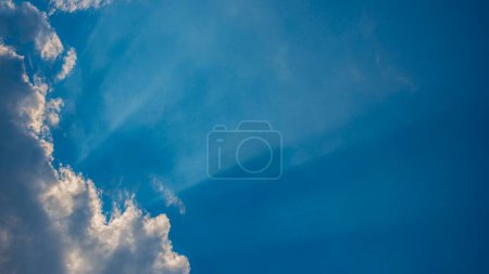 Photo for Sunbeams on the blue sky. Early spring. Web banner. - Royalty Free Image