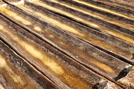 Photo for Wooden trays for the sea salt production in Amed, Bali - Royalty Free Image