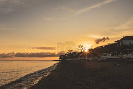 Photo for Beautiful sunrise over the sea at Amed beach, Bali, Indonesia - Royalty Free Image
