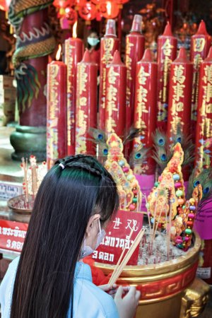 Photo for Chinese new year people praying in Chinatown Bangkok - Royalty Free Image