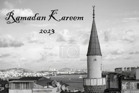 Photo for Mosque Minaret against sunset sky Ramadan Kareem Greetings - Royalty Free Image