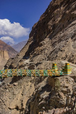Photo for Old wooden suspension bridge in Chaprot Valley, Karakoram Highway, Pakistan - Royalty Free Image