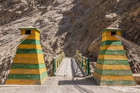 Photo for Old wooden suspension bridge in Chaprot Valley, Karakoram Highway, Pakistan - Royalty Free Image