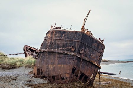Photo for Shipwreck called Amadeo on the  coast of Magellan Strait, rusty warship wreck, Tierra Del Fuego, Chile - Royalty Free Image